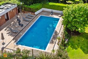 Outdoor Communal Swimming Pool- click for photo gallery